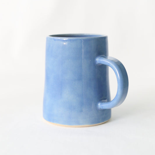 Handmade Pacific Blue ceramic pint mug by Katie L Thompson Designs, showcasing a classic design and vibrant blue color.
