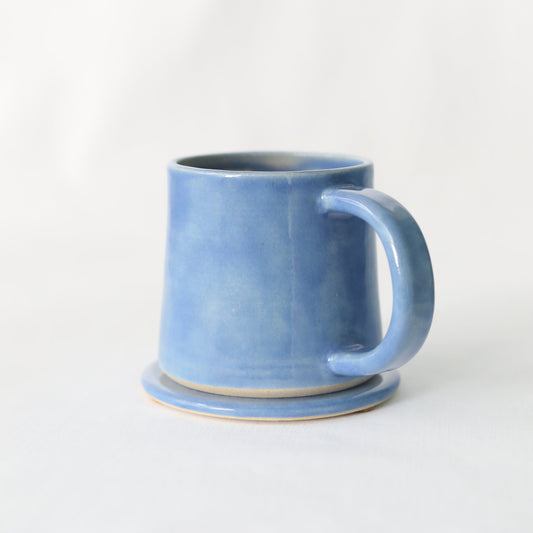 Handmade Pacific Blue ceramic coaster by Katie L Thompson Designs, featuring a classic, smooth blue finish with a stylish design.