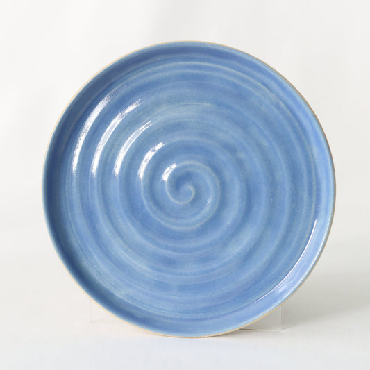 Handmade ceramic Pacific Blue Classic Cake Plate by Katie L Thompson Designs, featuring a smooth, vibrant blue finish.