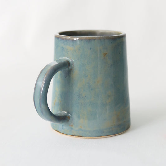 Seafoam blue ceramic pint mug by Katie L Thompson Designs, handmade with a classic design and smooth finish.