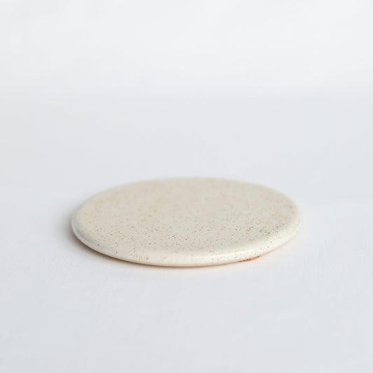 Handmade ceramic Pepper White Classic Coaster by Katie L Thompson Designs with a smooth, glossy finish and elegant design.