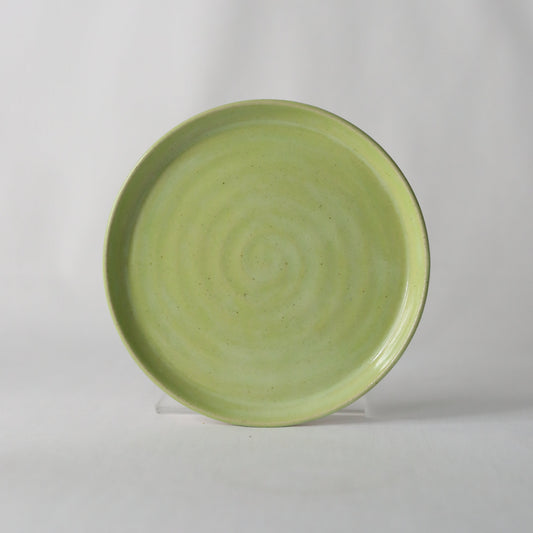 Handmade spring green ceramic cake plate by Katie L Thompson Designs with a classic, elegant design for serving desserts.