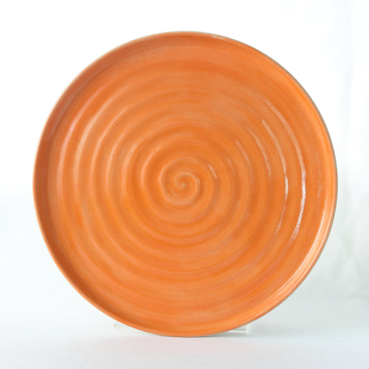 Handmade ceramic side plate with a vibrant mandarin orange design by Katie L Thompson Designs