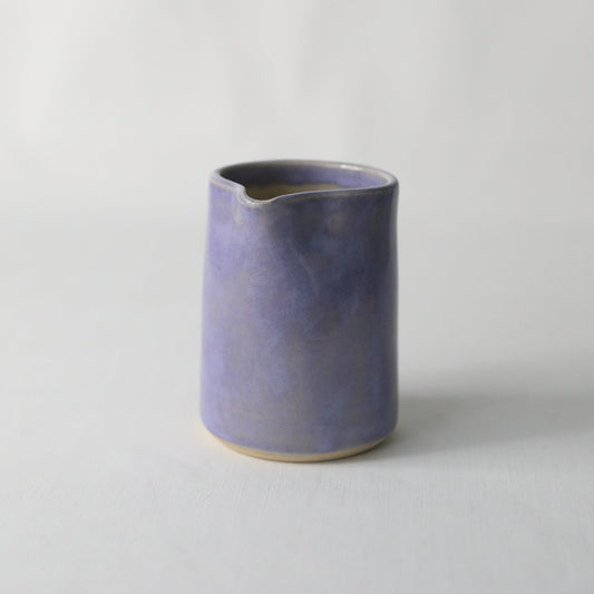 Handmade amethyst purple ceramic small jug by Katie L Thompson Designs, featuring a classic, elegant shape for decorative or functional use.