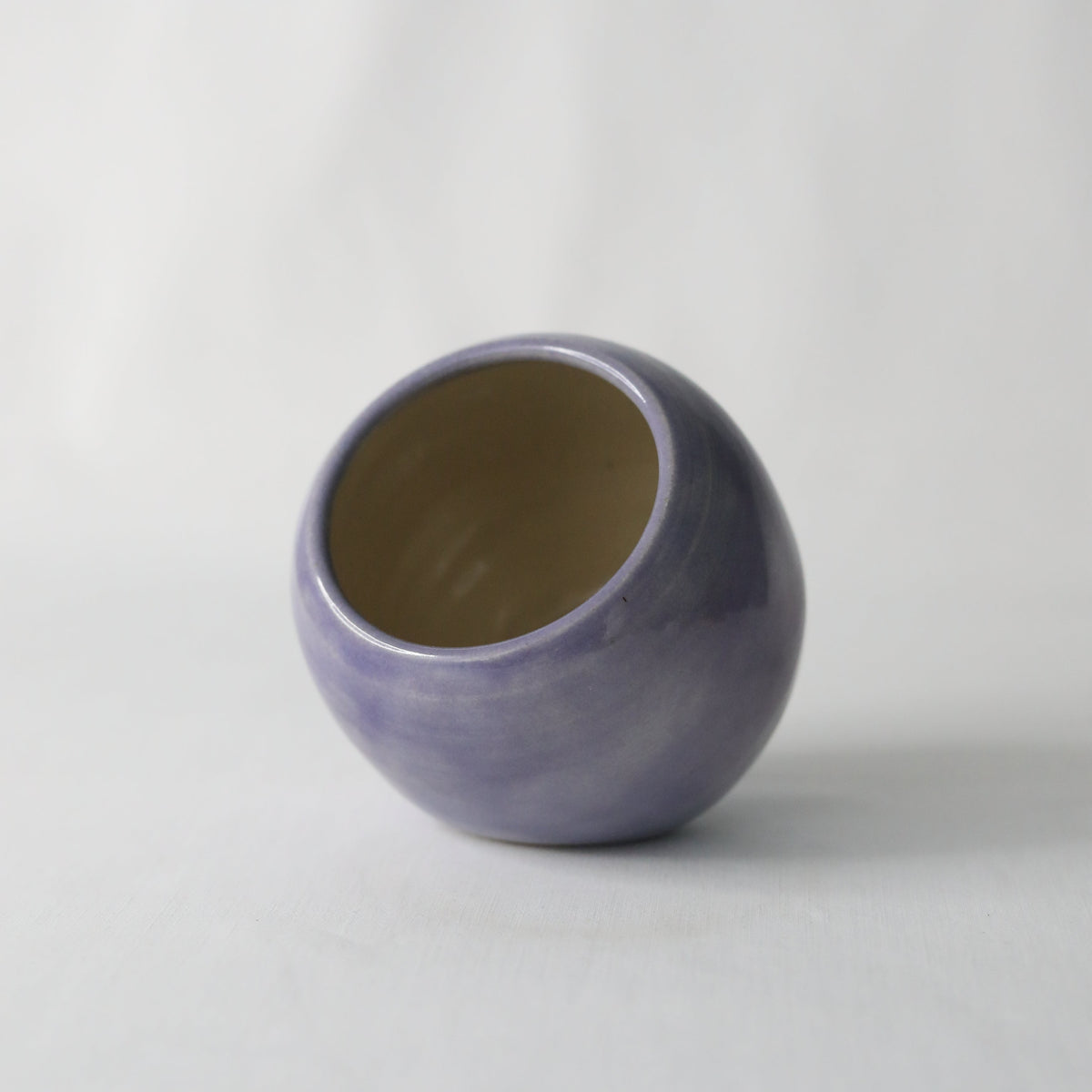 Handmade purple ceramic salt pig by Katie L Thompson Designs, featuring a classic amethyst purple finish for kitchen storage.