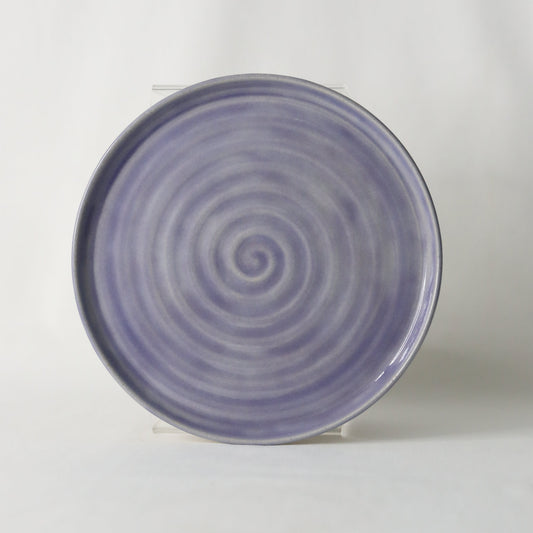 Handmade purple ceramic Amethyst Classic Side Plate by Katie L Thompson Designs, showcasing a smooth, round surface with a glossy finish.