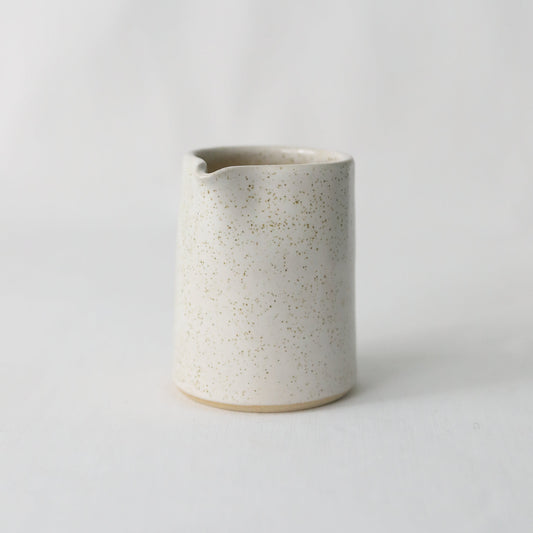 Handmade white ceramic Pepper White Classic Small Jug by Katie L Thompson Designs, featuring a smooth, rounded ceramic vessel.