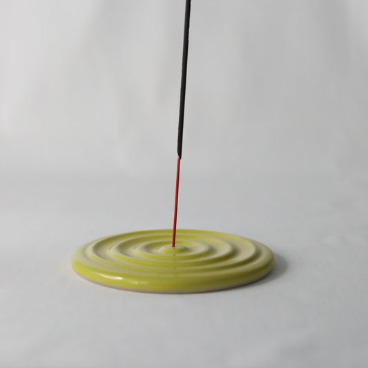 Handmade sun yellow ceramic incense burner by Katie L Thompson Designs, featuring a classic design for aromatic use.