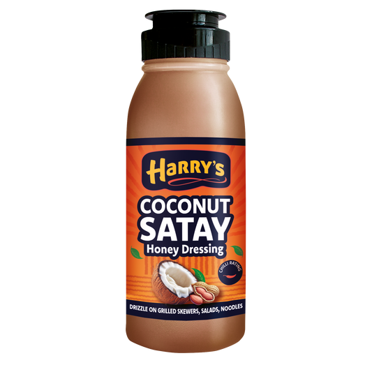 Bottle of Harry's Hot Honey Coconut Satay Honey Dressing with a clear label and golden honey color.