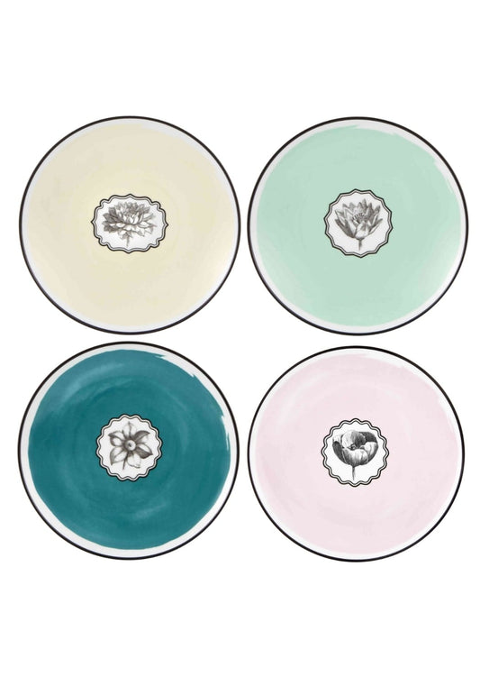 Set of four Herbariae Christian Lacroix dessert plates featuring botanical designs, perfect for elegant table settings.