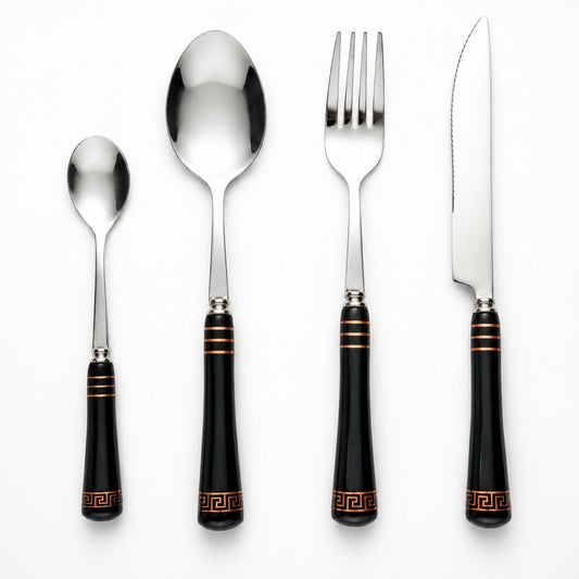 KitchBoom Heritage Gold 16-piece black cutlery set with polished forks, knives, and spoons arranged on a table.