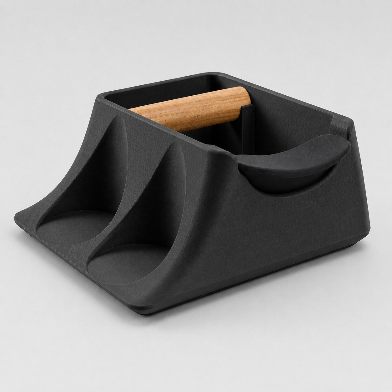 Charcoal KNOCDIC® Hub coffee knock box and tamper holder with tamping station for espresso preparation.