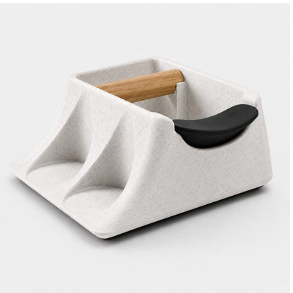 White marble coffee knock box and tamping station with tamper holder from KNOCDIC® The Hub for espresso preparation.