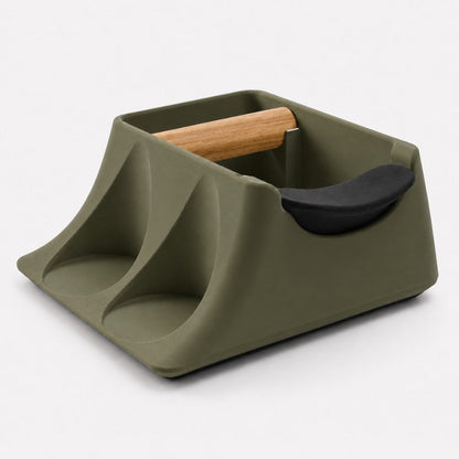 Olive green KNOCDIC® Hub coffee knock box with tamping station and tamper holder for espresso preparation.
