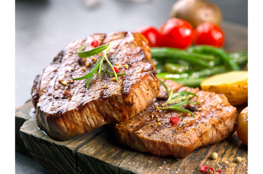 Prime dry-aged beef sirloin steaks from Primrose Herd, showcasing marbled, juicy beef cuts ready for grilling or cooking.