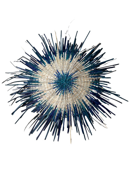 Blue Malawi Sun Wall Basket by Botanical Boys, 55cm, woven wall decor with a sunburst design in natural and blue tones.