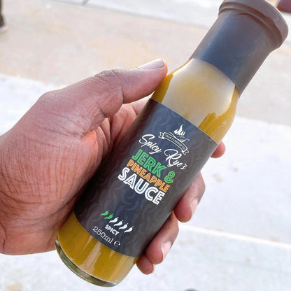Spicy Ryes jerk and pineapple hot sauce bottle with vibrant label, showcasing the flavorful sauce inside.