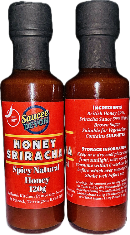 Spicy Honey Sriracha sauce in a glass jar from Wilson’s Kitchen, showcasing the artisan chili sauce with a vibrant red hue.
