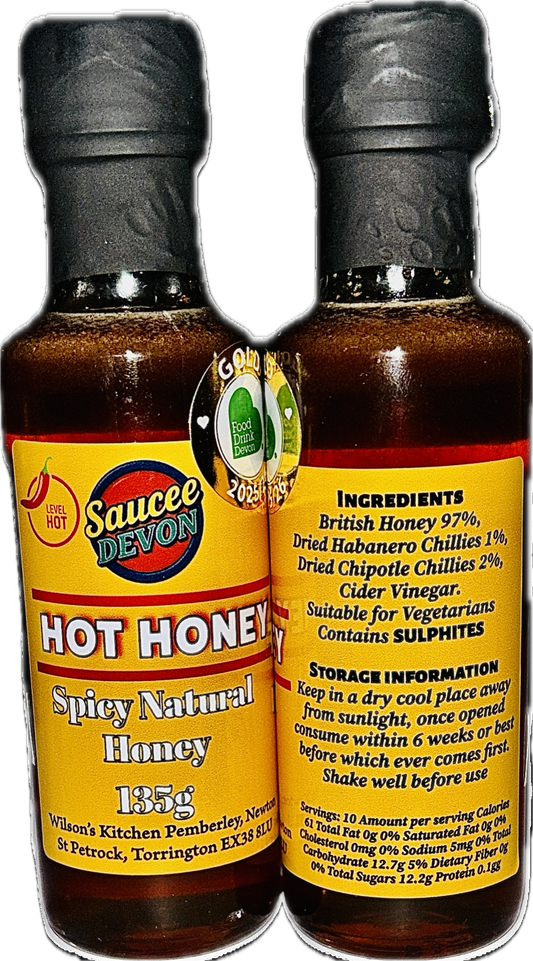 Bottle of Wilson’s Kitchen Hot Honey artisan chili sauce with a golden honey color and chili peppers on the label.