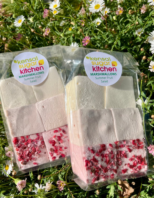 Colorful summer fruit salad flavored marshmallows from Kensal Sugar Kitchen, displayed in a clear bowl.