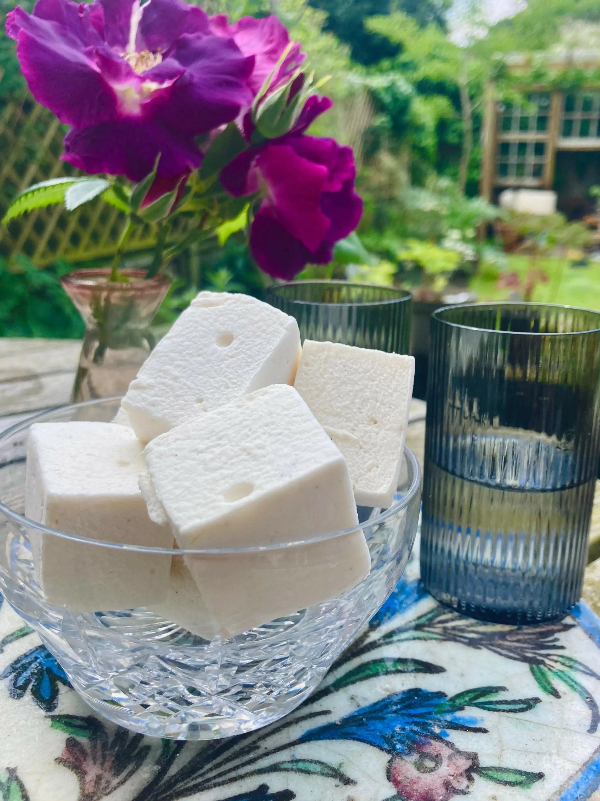 Kensal Sugar Kitchen passionfruit marshmallows with vibrant purple and yellow colors, soft and fluffy texture, and tropical flavor.