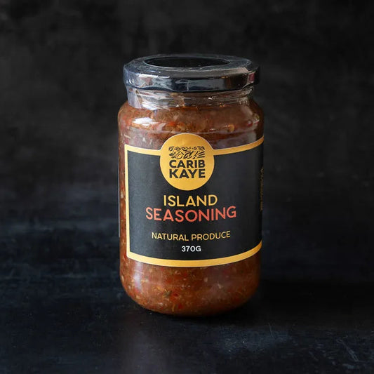 CaribKaye Island Seasoning marinade in a bottle, ideal for grilling and flavorful dishes, with vibrant label and seal.
