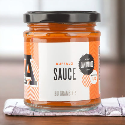 Janda Food Chilli Lover's Trio gift box with three jars of spicy condiments, including buffalo sauce, displayed on a white background.