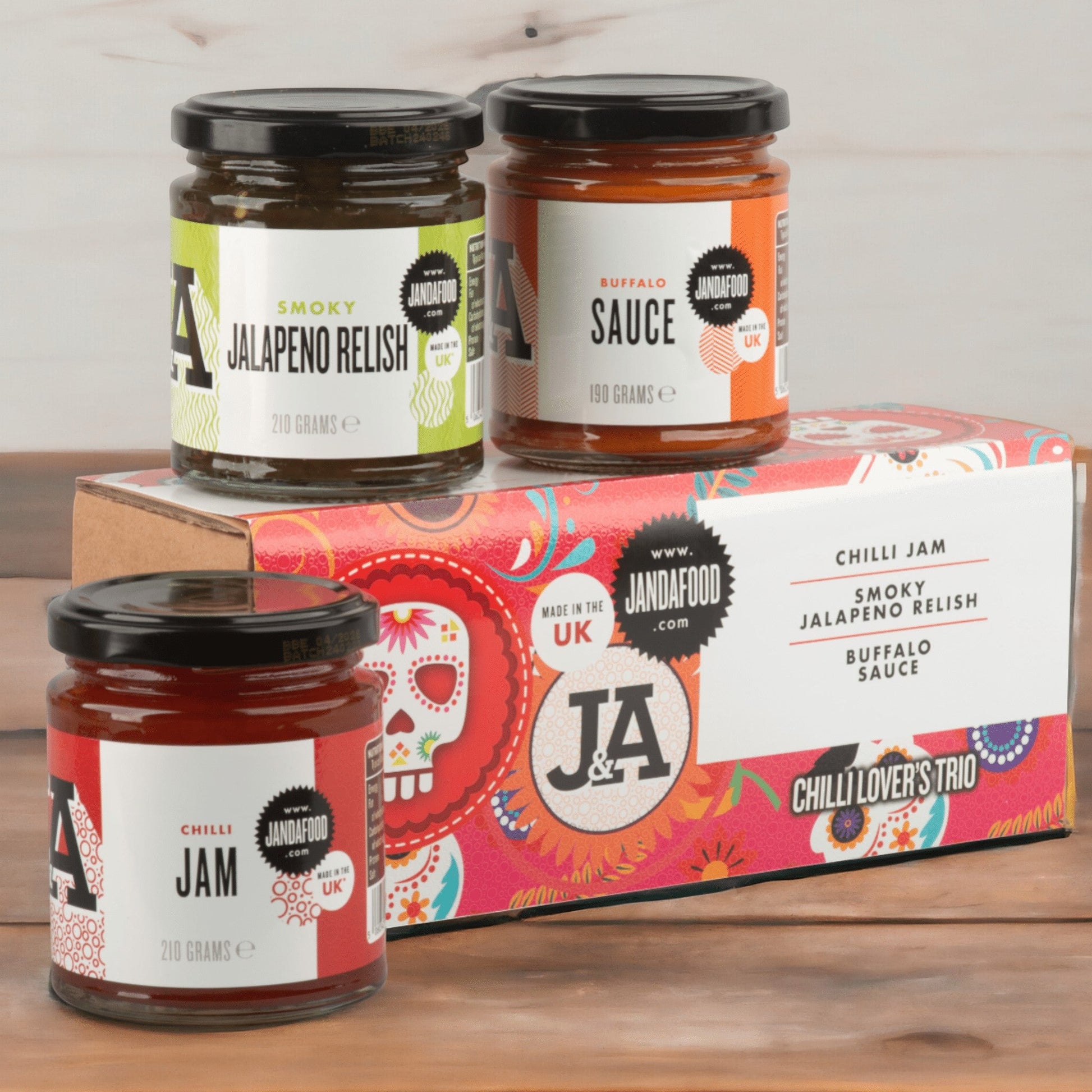 Janda Food Chilli Lover's Trio condiment gift set featuring three jars of spicy chili sauces in a decorative gift box.