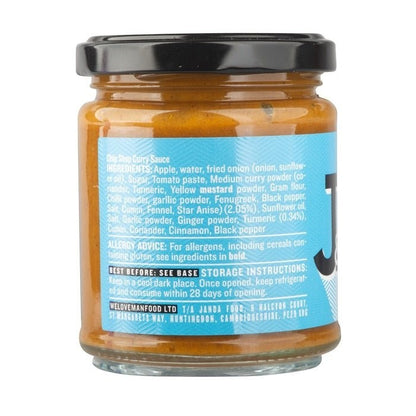 Jar of Janda Chip Shop Curry Sauce with label showing product name and branding, ready for serving with chips.