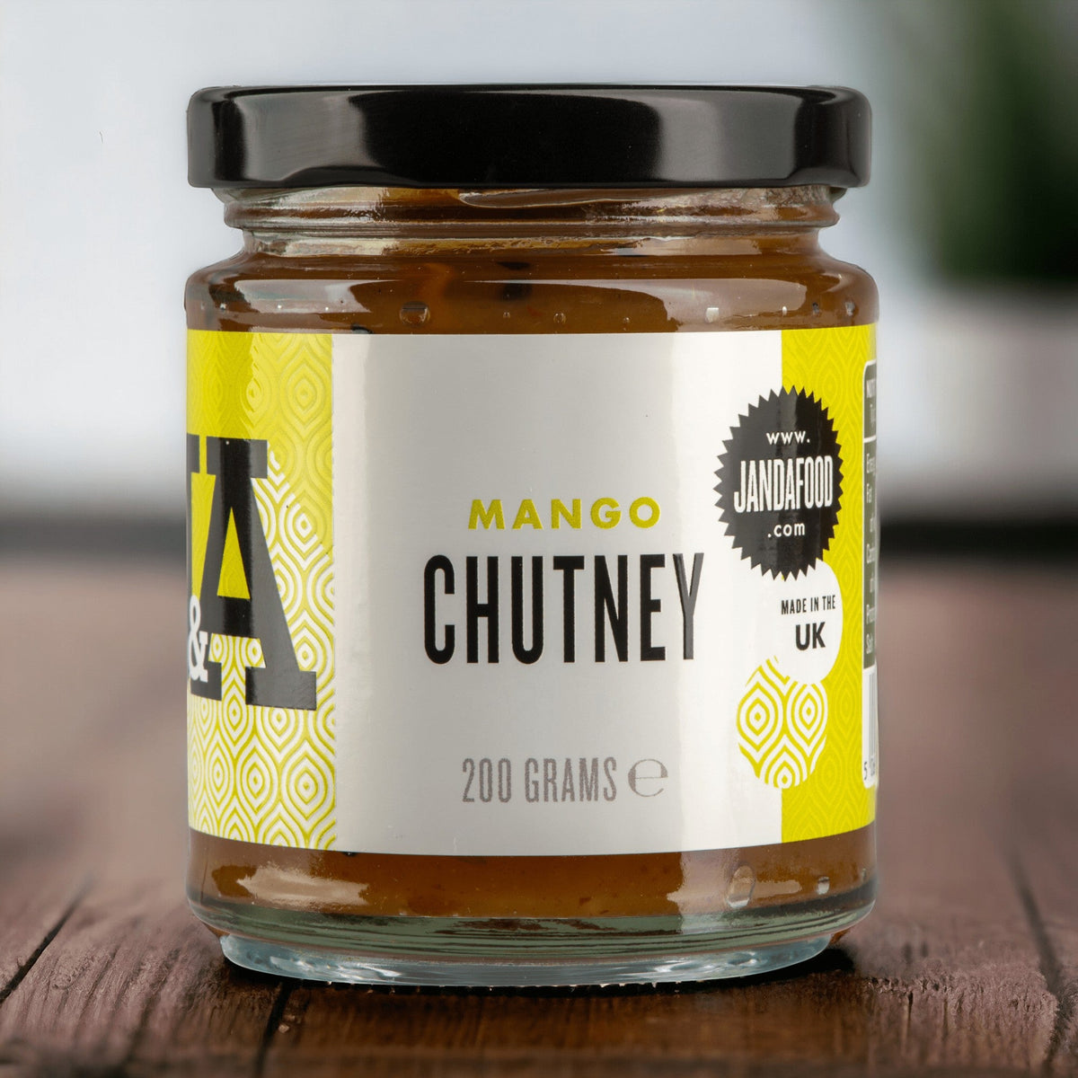 Janda Mango Chutney jar, a flavorful Indian condiment with ripe mango pieces and spiced sauce in a glass jar.