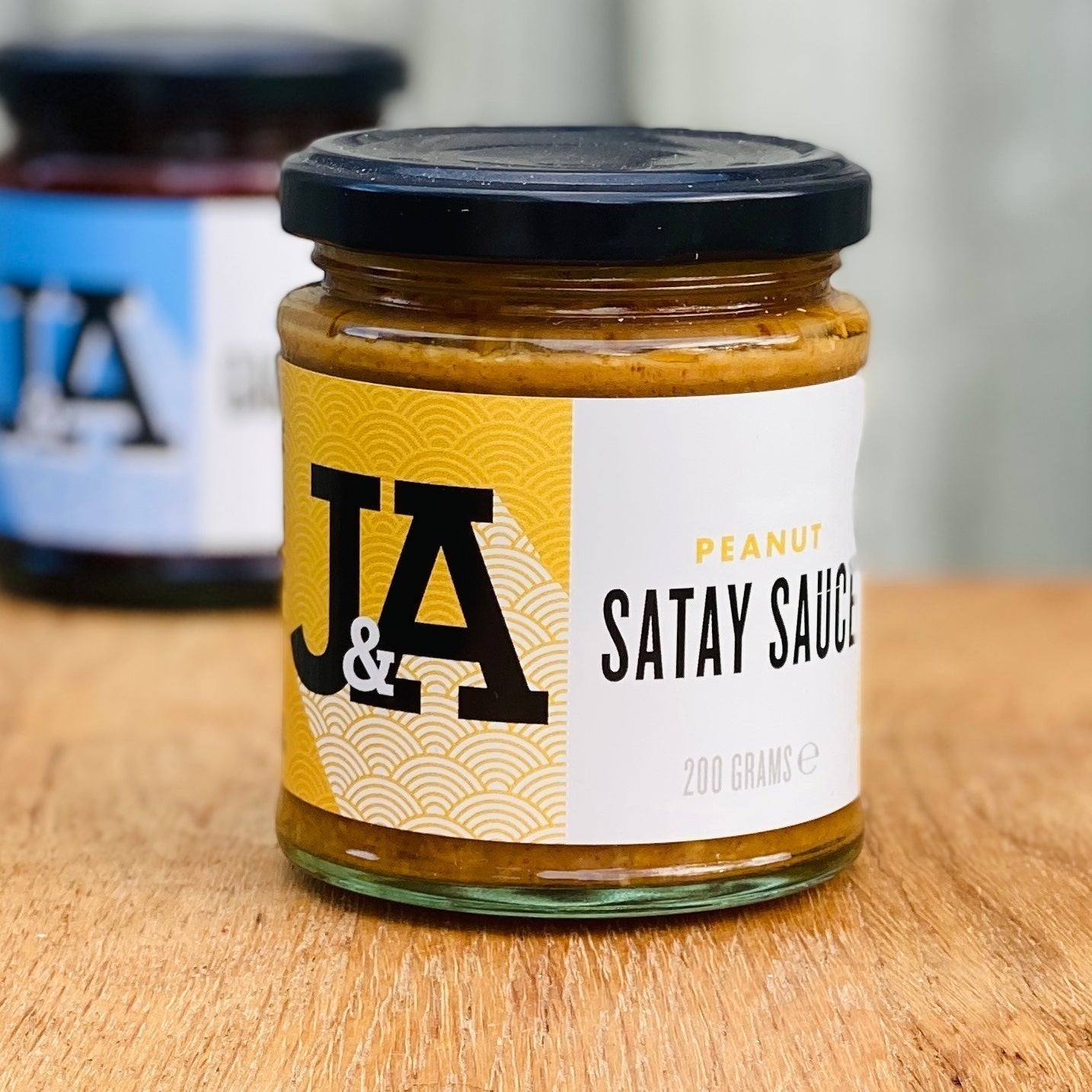 Janda Taste of Asia gift box featuring peanut satay sauce in a decorative gift box, ideal for Asian cuisine lovers.