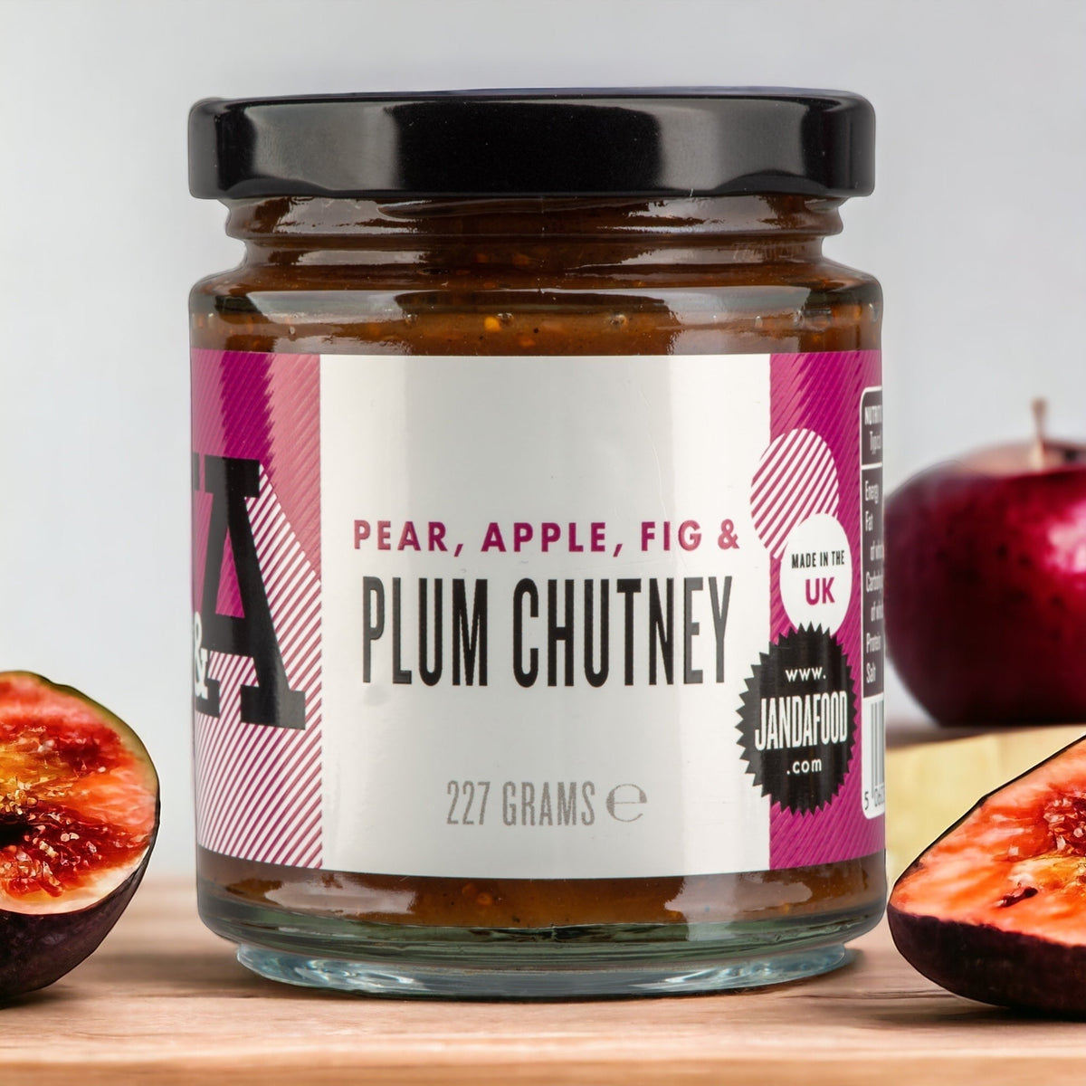 Janda Pear, Apple, Fig & Plum Chutney jar with label, showcasing the colorful chutney inside, ready to serve or enjoy.