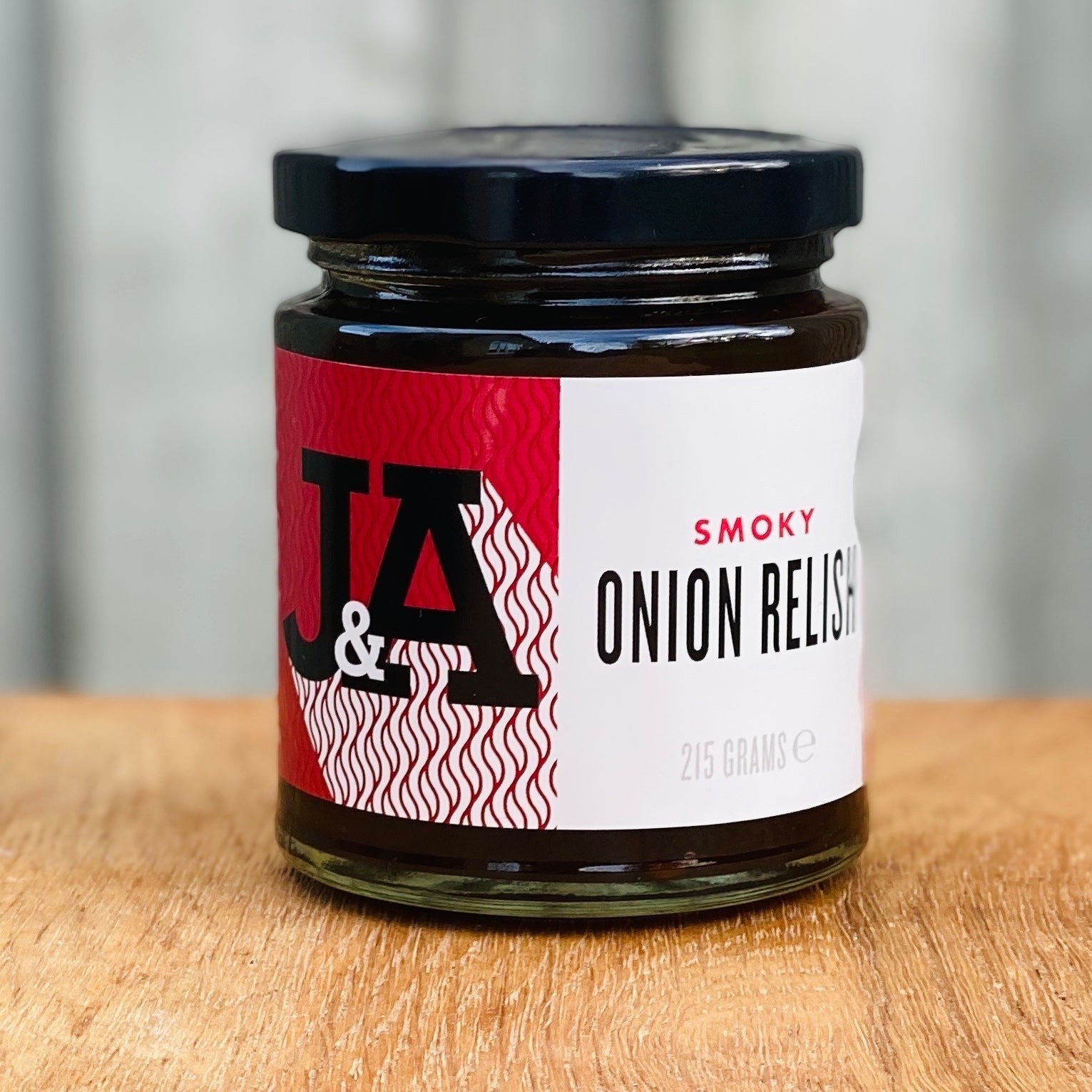 Janda gift box with three chutney and relish jars, featuring smoky onion relish in a stylish packaging.