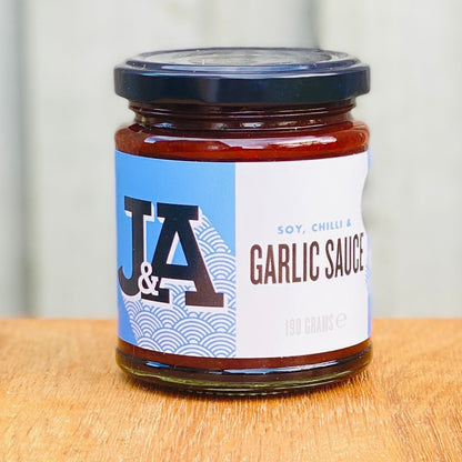 Janda Taste of Asia gift box featuring soy, chili, and garlic sauces in a decorative gift box.