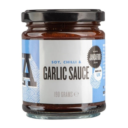 Bottle of Janda Soy, Chilli & Garlic Sauce showing the label and clear glass container with dark sauce inside.