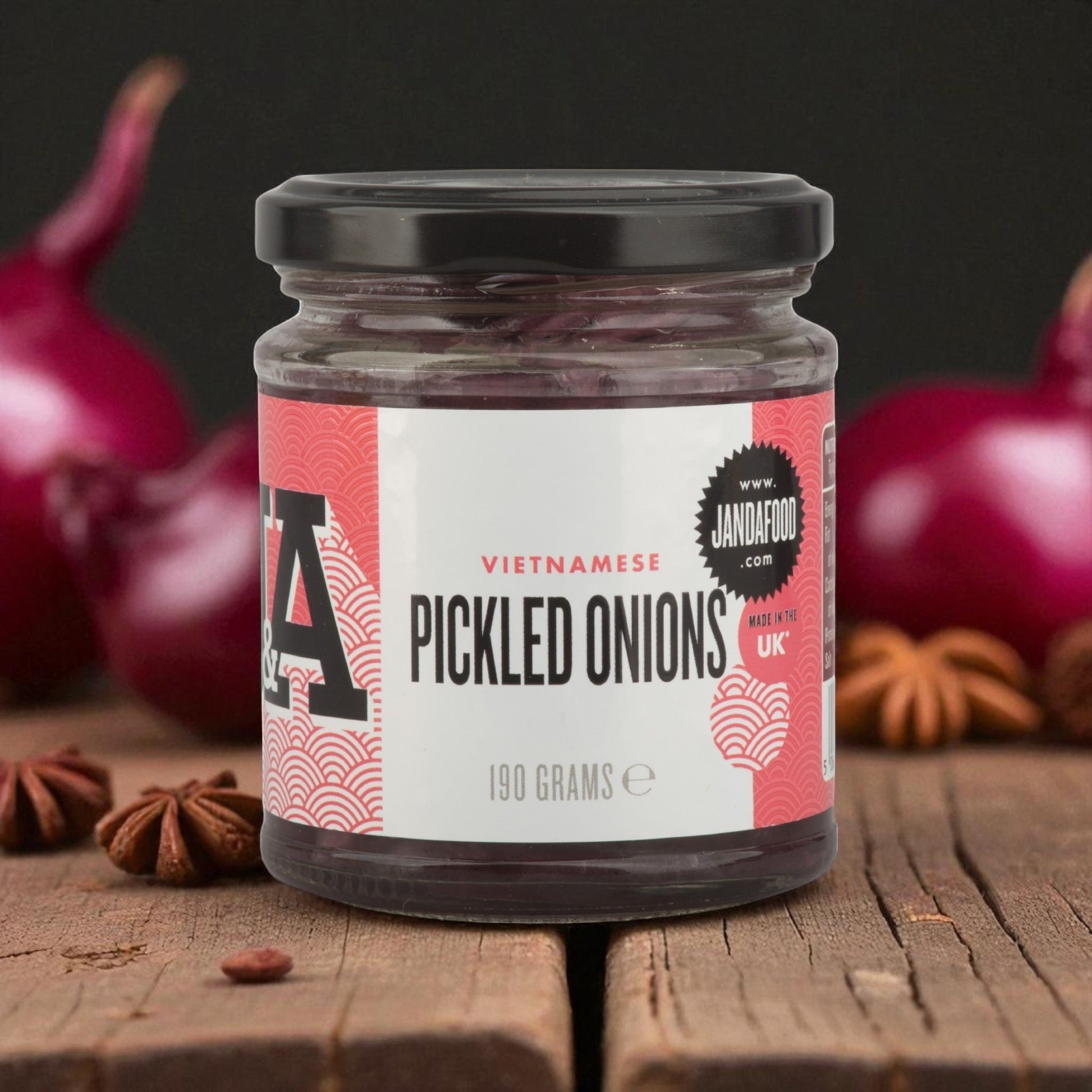 Janda Vietnamese Pickled Onions in a jar, sliced red onions marinated in spiced red wine vinegar, ideal for Banh Mi sandwiches.