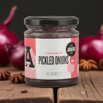 Janda Vietnamese Pickled Onions in a jar, sliced red onions marinated in spiced red wine vinegar, ideal for Banh Mi sandwiches.