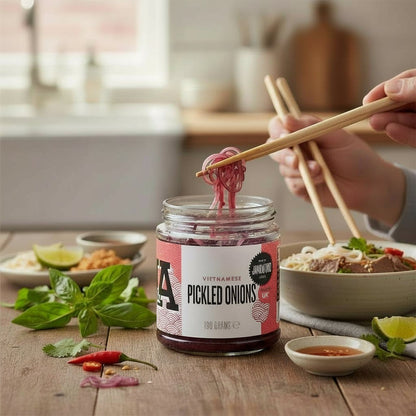 Janda Vietnamese Pickled Onions in a jar, sliced red onions soaked in spiced red wine vinegar, ideal for Banh Mi sandwiches