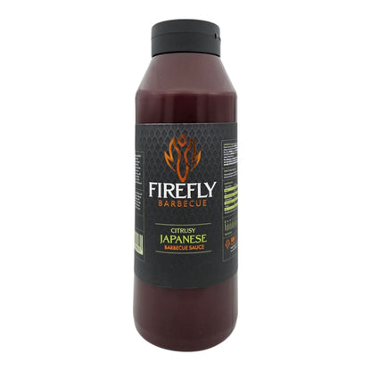 Bottle of FireFly Barbecue Japanese BBQ Sauce showing the label and dark brown sauce inside the 1-liter bottle.