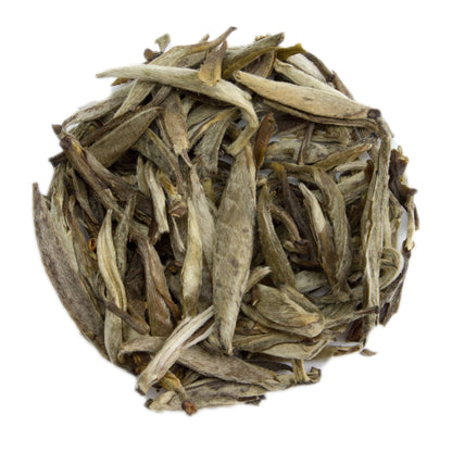 Fujian Jasmine Silver Needle White Tea leaves from PekoeTea Edinburgh, showcasing delicate white tea buds with jasmine aroma.