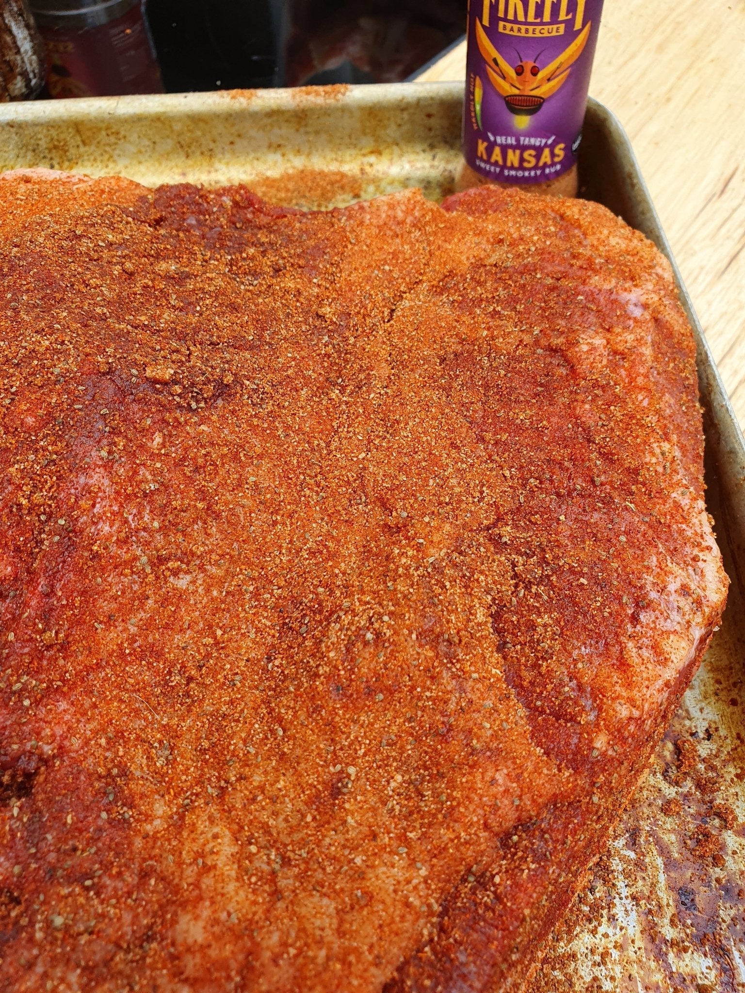 FireFly Barbecue Kansas Sweet & Smoky BBQ Rub in a jar, showcasing the flavorful spice blend for grilling and barbecuing.