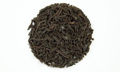 Kenilworth Ceylon Orange Pekoe tea from PekoeTea Edinburgh, featuring a close-up of the tea leaves in a clear glass jar.