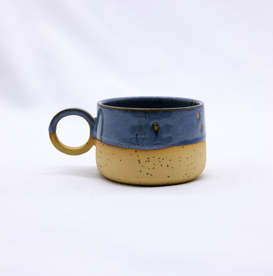 Handmade stoneware ceramic mug with a rustic finish from Ribera Handmade Ceramics, featuring a unique Perugia design.