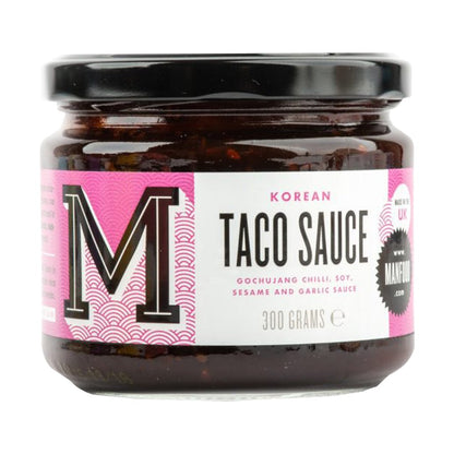Manfood Korean Taco Sauce bottle, spicy and flavorful sauce with vibrant packaging, ideal for enhancing taco dishes.