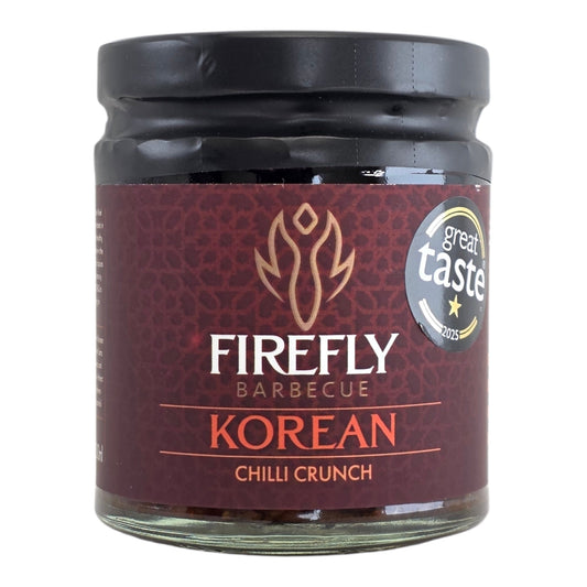 FireFly Barbecue Korean Chilli Crunch spicy hot sauce in a jar, showcasing its vibrant red chili topping and crunchy texture.