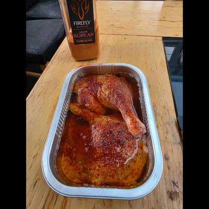FireFly Barbecue Korean UMAMI BBQ Rub on duck, showing the spice blend and glazed meat for flavorful grilling.