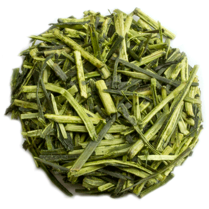 PekoeTea Edinburgh Karigane Kukicha green tea leaves in a clear glass jar, showcasing light green tea and twig-like stems.