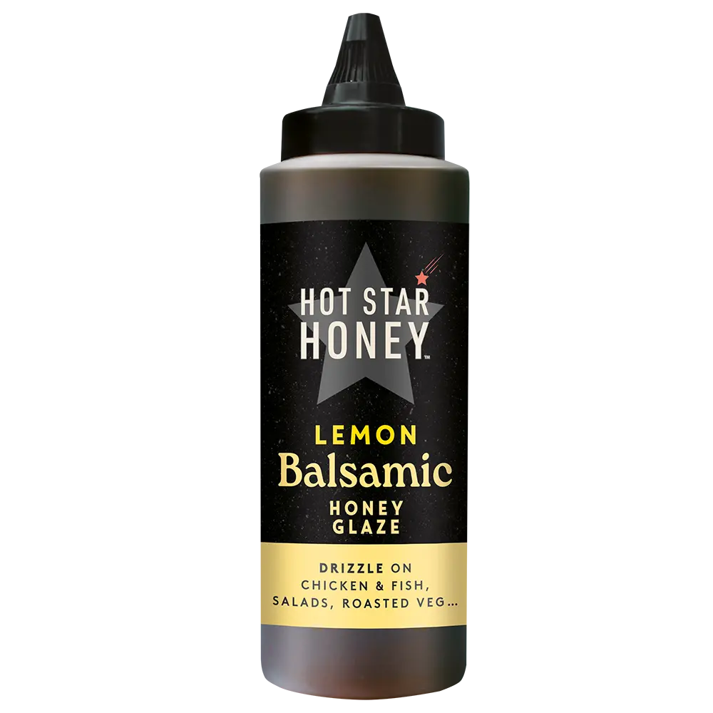 Hot Star Honey Lemon Balsamic Honey Glaze bottle with a clear label, showcasing the golden glaze in a glass bottle.