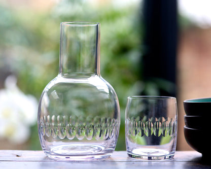 Crystal carafe set with lens design by The Vintage List, featuring elegant glassware with intricate optical-inspired patterns.