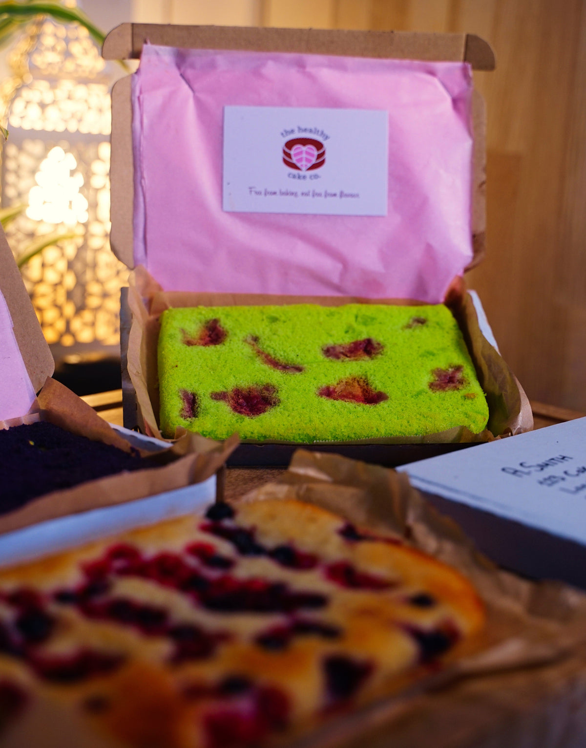Letter box cake from The Healthy Cake Company, showcasing a beautifully decorated, gift-ready cake in a box.